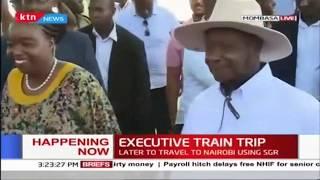 President Uhuru and President Museveni board the SGR