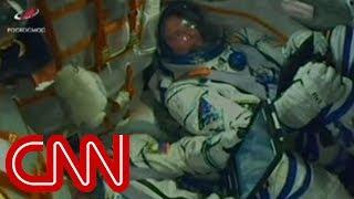Astronauts react inside rocket during emergency landing